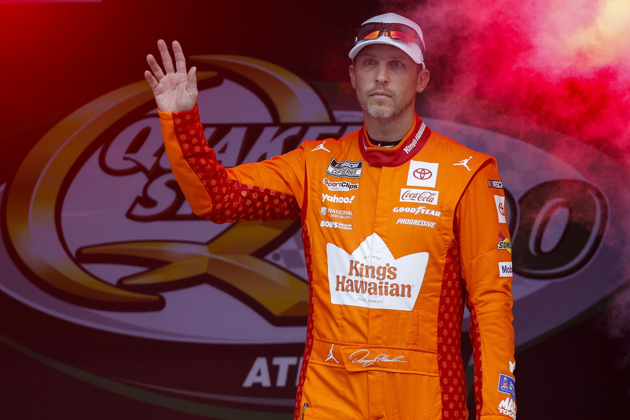 Denny Hamlin Triumphs Through Rain and Overtime for Epic Dover Victory!